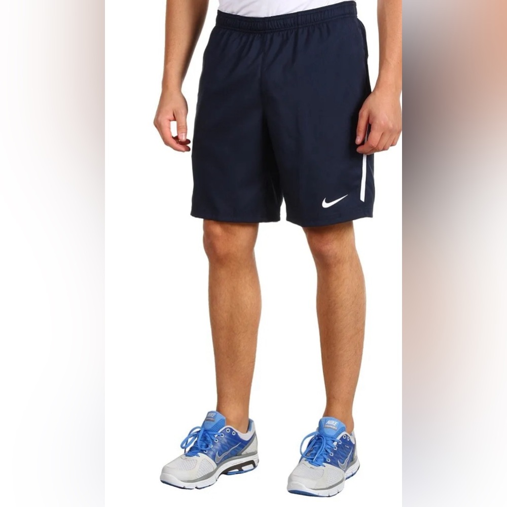 NIKE ATHLETIC SHORTS BLUE EITH WHITE STRIP M
